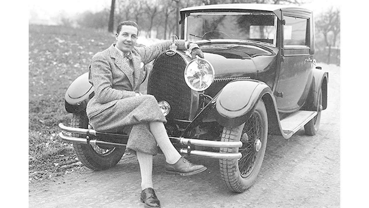 Jead Bugatti sitting on a Bugatti
