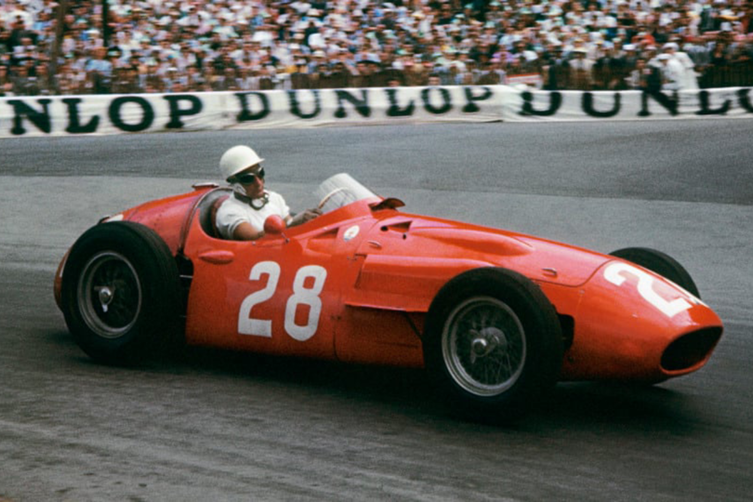 The 250F of Stirling Moss leads the 1956 Monaco Grand Prix. Goodwood Revival. 