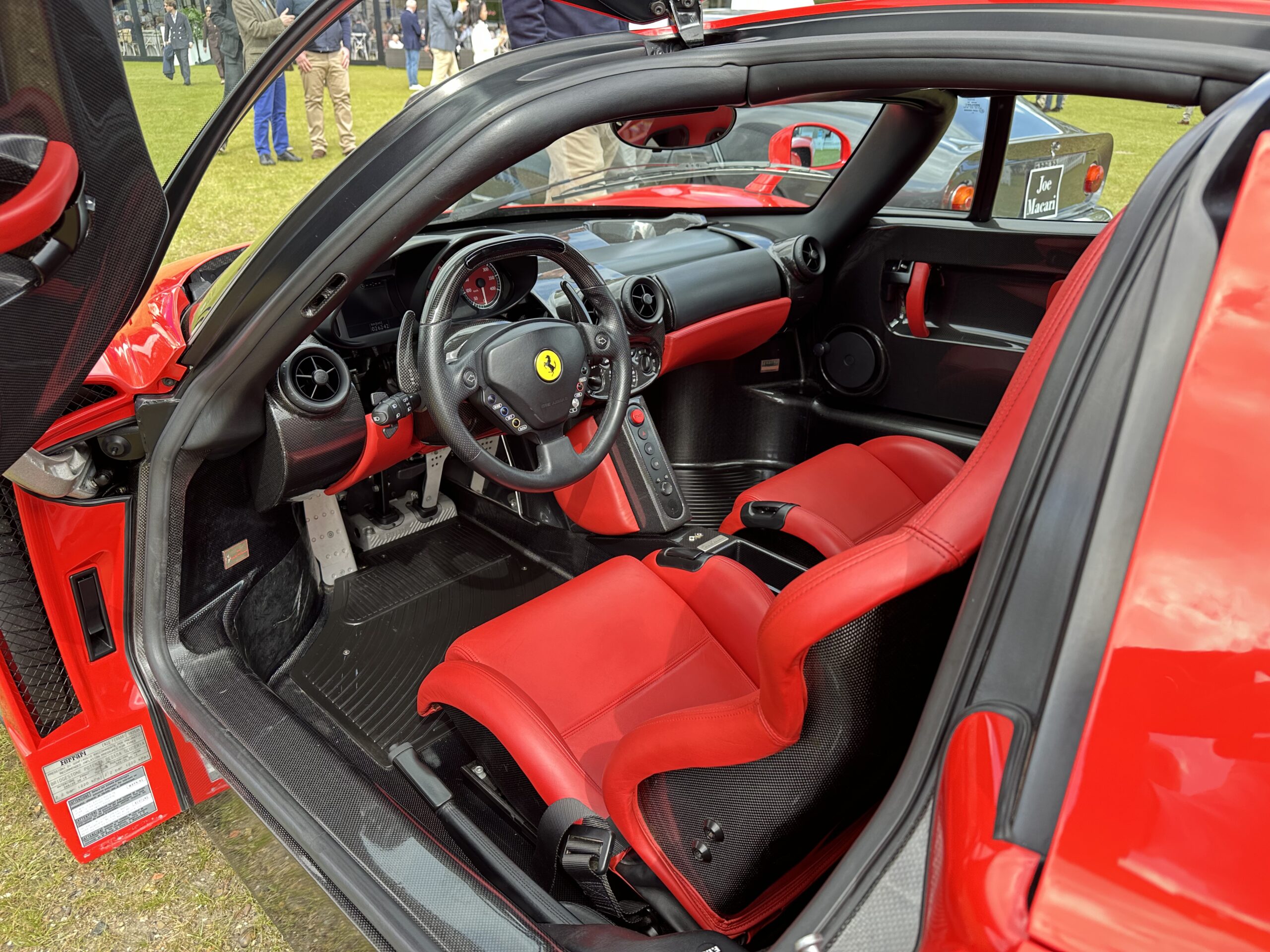 Ferrari Enzo (in Rosso Scuderia) at Salon Privé London 2026.